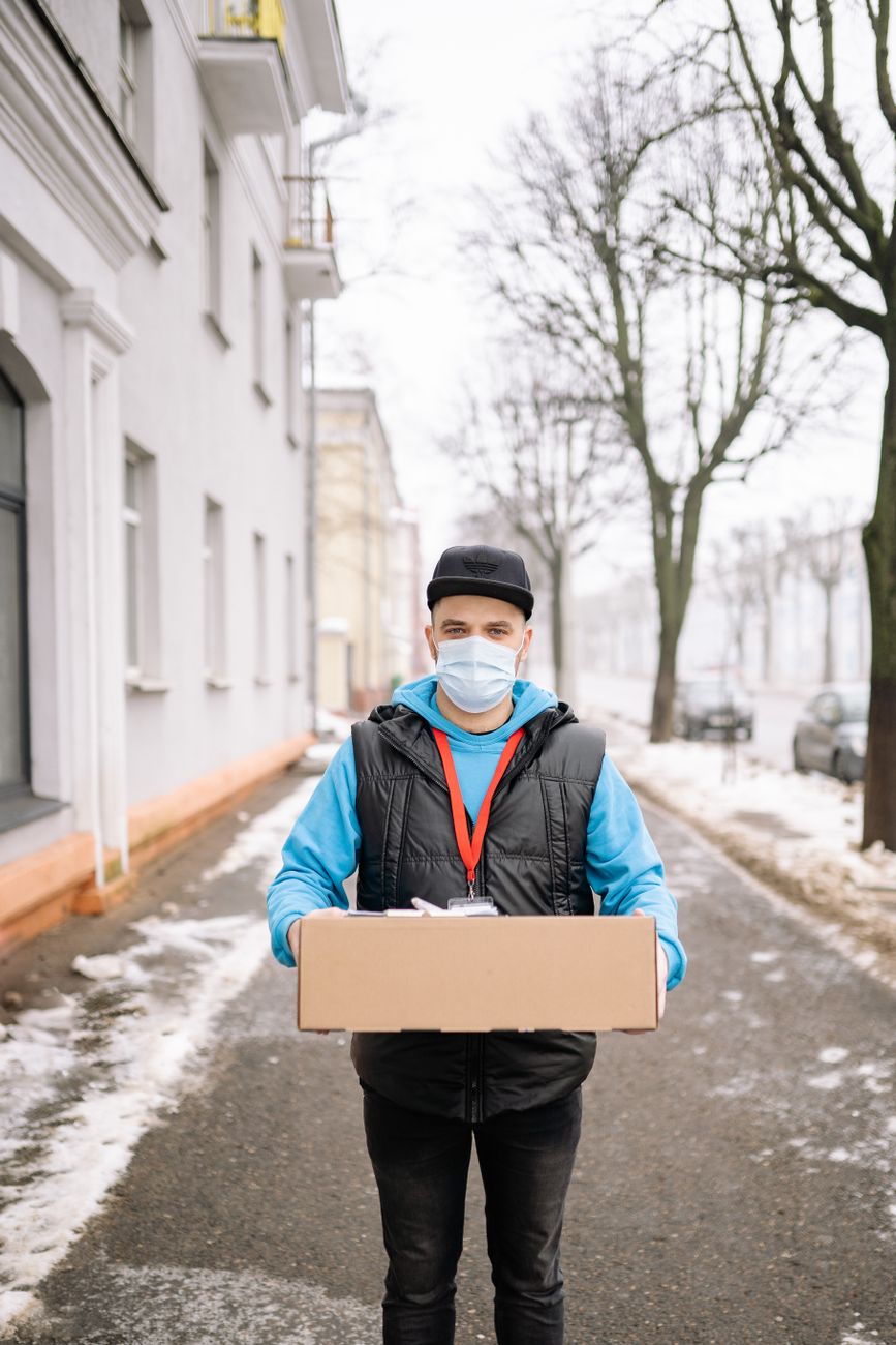 Professional courier handling a secure medical package